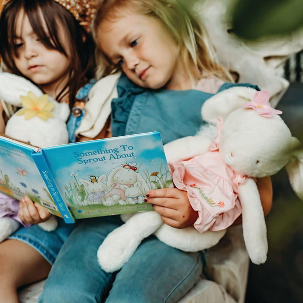 Children Reading Garden Blossom's book with Bunny