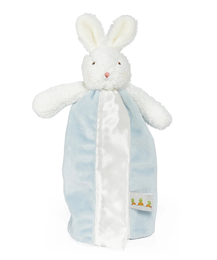White plush bunny toy with a blue blanket on a white background