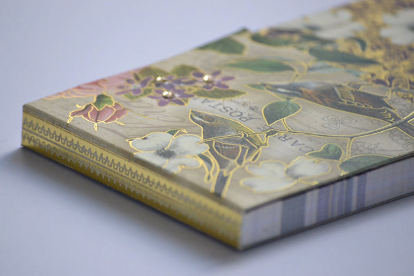 Detail view of Notepad w/ Gems & Gold Accents