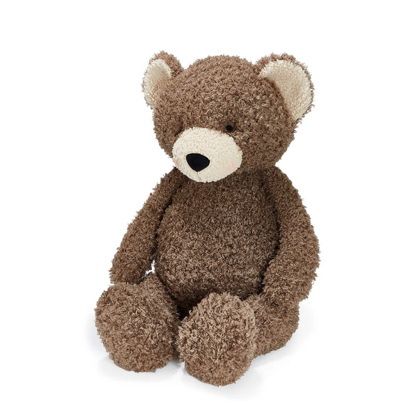 Side View Brown teddy bear on a white background