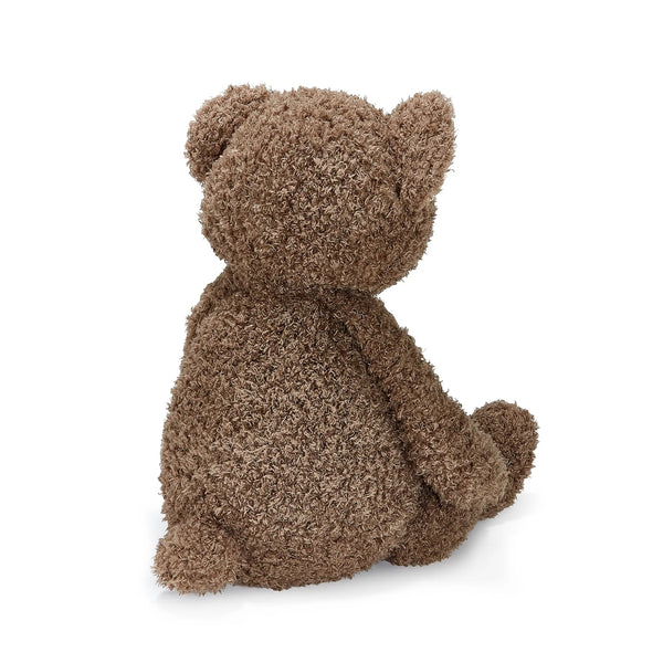 Back View Brown teddy bear sitting on a white background