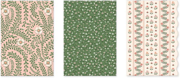 Three different floral patterned paper card designs on a white background