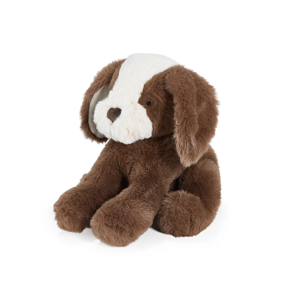 Brown and cream plush dog toy on a white background