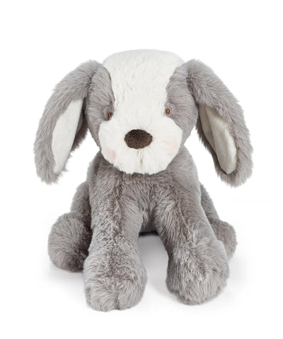 Gray and white plush dog toy on a white background