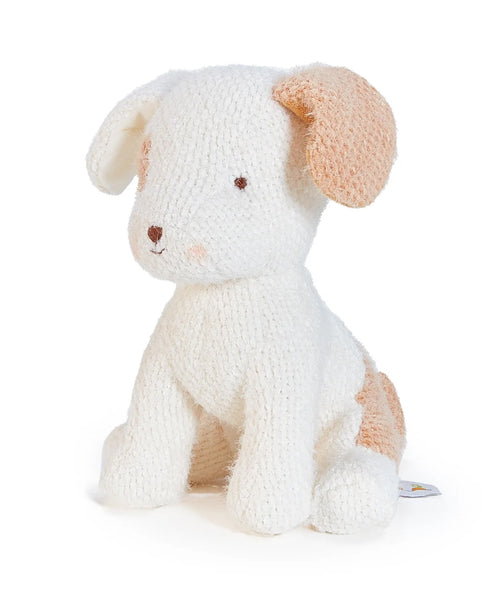 Knitted dog toy with white body and tan patches on a white background