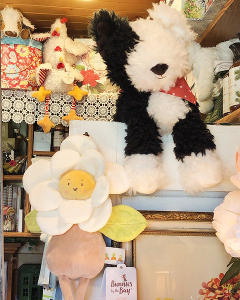 Stuffed Animal Dog & Flower in The Little Red Shop