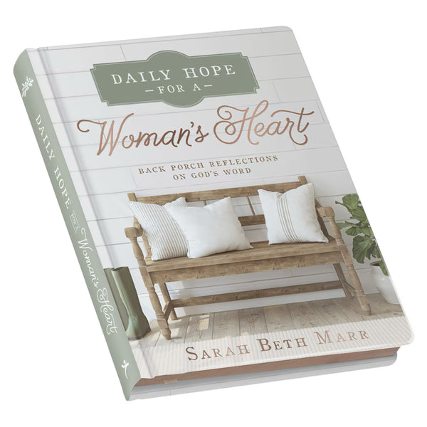 Book titled 'Daily Hope for a Woman's Heart' by Sarah Beth Marr with a bench and pillows on the cover.