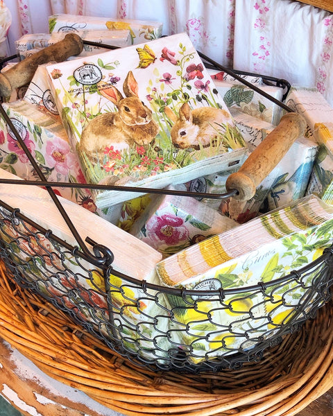 Michel Design Works Bunny Meadow Cocktail Napkins in a Basket full of Napkins