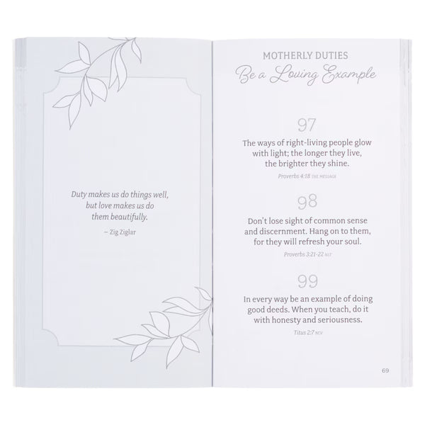 Open book showing pages with Scripture and decorative elements on a white background