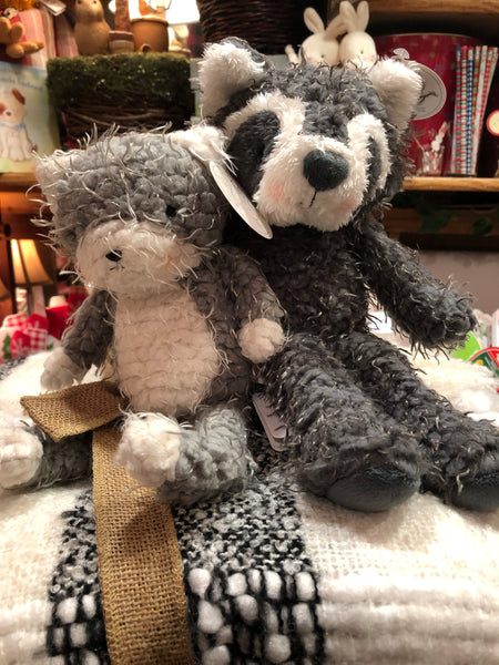 Plush Toy Kitty & Raccoon on Throw Blanket in The Little Red Shop