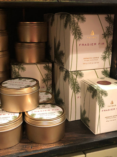 Store Display of Thymes Frasier Fir Candle tins and boxes 
