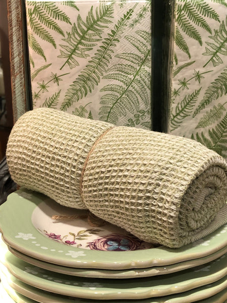 DII Pear Stonewashed Waffle Towel on Stack of Green Floral Plates with Two's Co Fern Hostess Napkins
