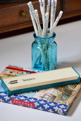 Vintage Drawing Pencil Case on Desk with Aqua Jar of Pencils & Journal