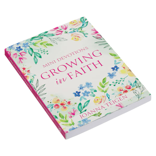 Book titled 'Growing in Faith' with floral design on a white background