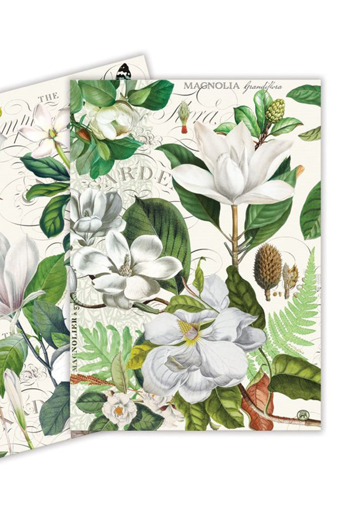 Michel Design Works Kitchen Towels with Magnolia flowers and green leaves on a white background