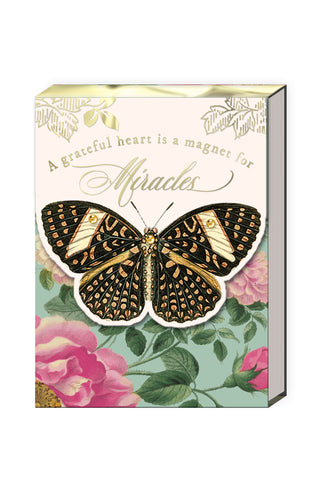 Pocket Notepad with butterfly design and floral elements on a white background
