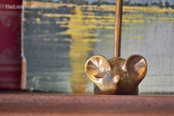 Close up view Vintage Brass Mouse Note or Receipt Holder