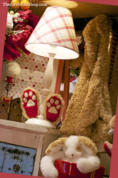 Baby Boutique Display featuring Bunnies by the Bay's Bao Bao Bear Feet Slippers, Coat, and Floppy Skipit Dog