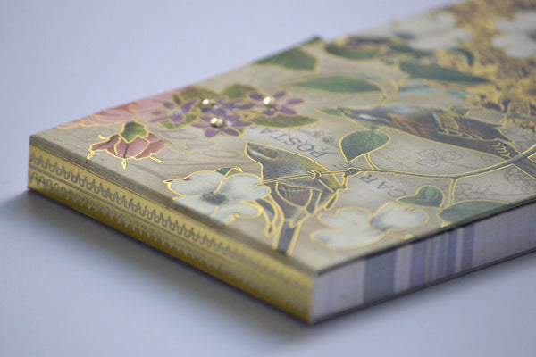 Detail view of Notepad w/ Gems & Gold Accents 