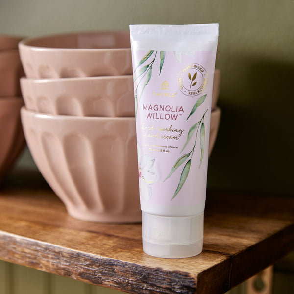 Thymes Magnolia Willow Hand Cream on a Wood Shelf with Bowls