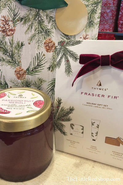 Thymes Passionfruit Neroli Candle shown with the Frasier Fir Gift Set